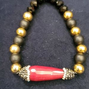 Beautiful bracelete with a red stone